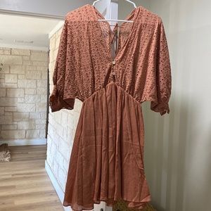Eyelet dress with tie on back
